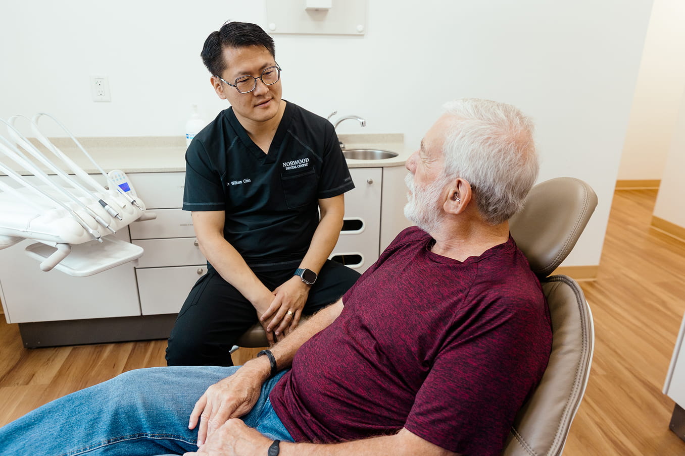 Reviewing treatment options during an adult dental visit