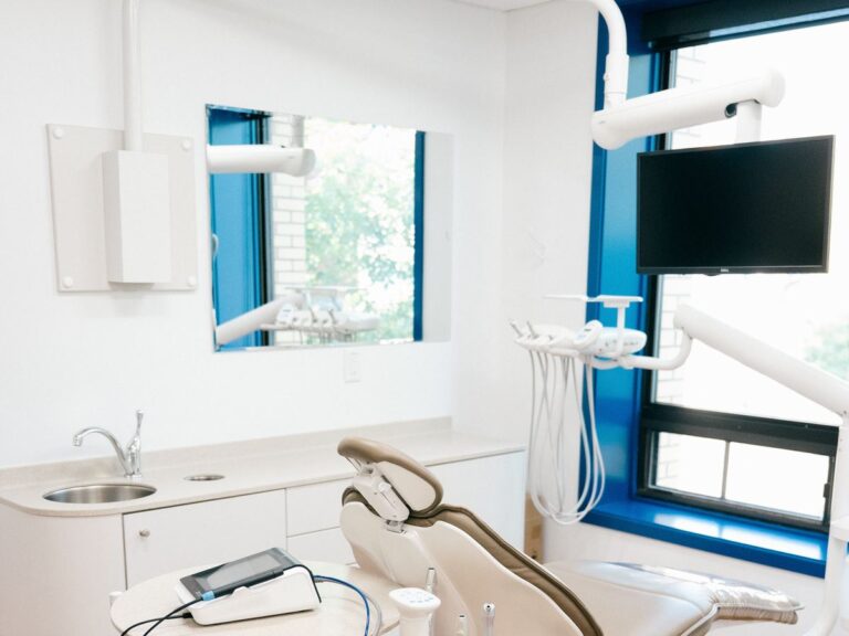Patient chair with a wall-mounted TV at Norwood Dental Centre