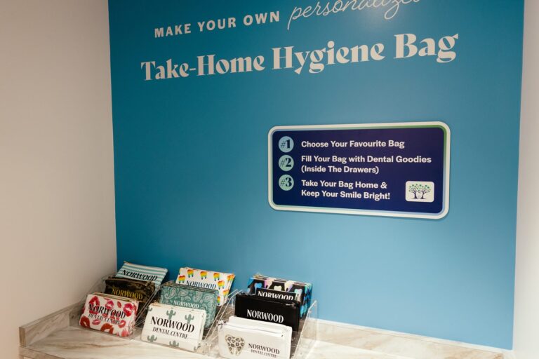 The Take-Home Hygiene Bag station with branded Norwood Dental Centre pouches