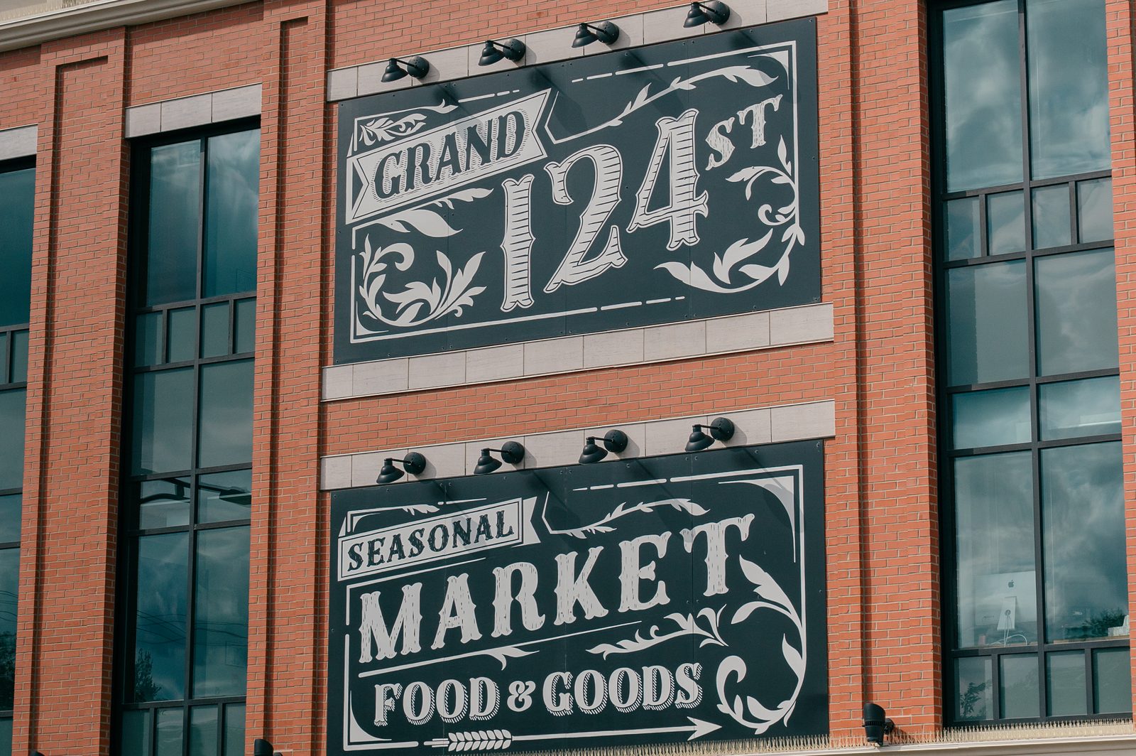 The Grand 124 Street Market signage on 124 Street near the Inglewood clinic