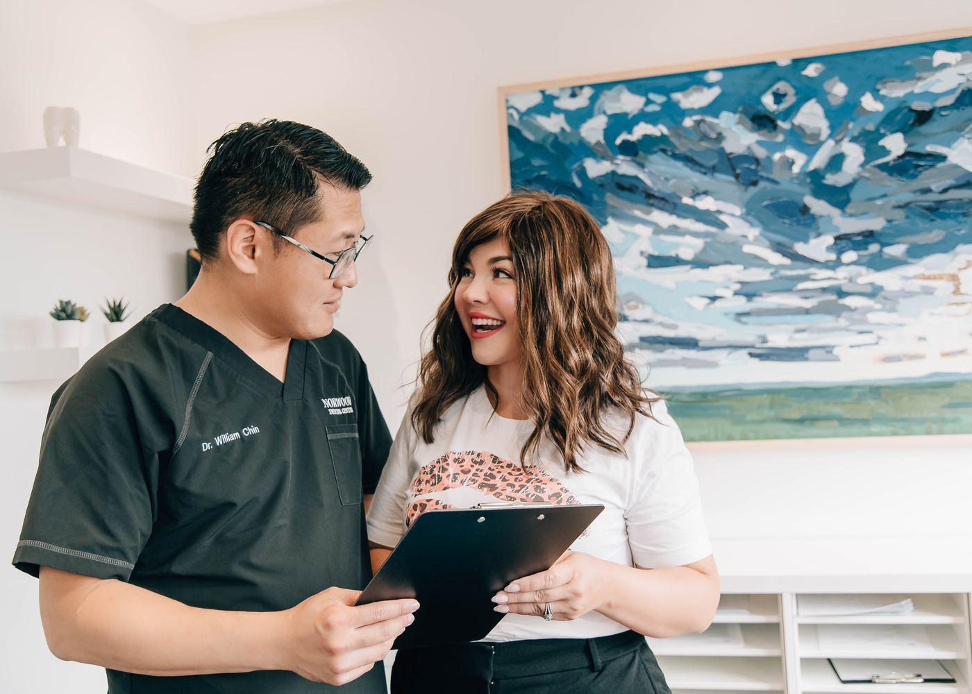 Dr. William Chin and Amanda Chin in conversation at the clinic